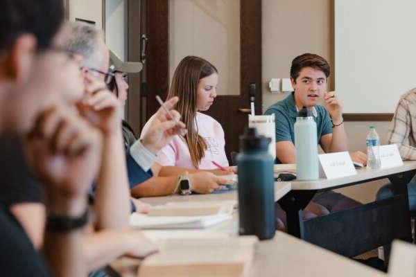 students in a discussion circle